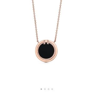 Authentic Tiffany Diamond and Black Onyx Circle Pendant